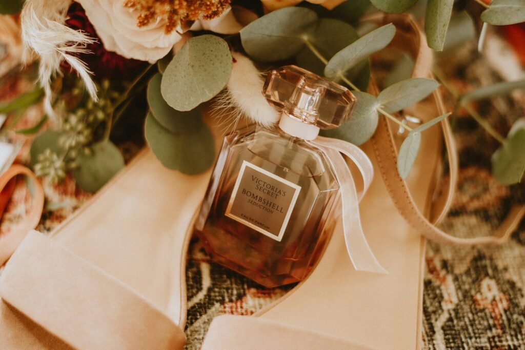 a bottle of perfume sitting on top of a table